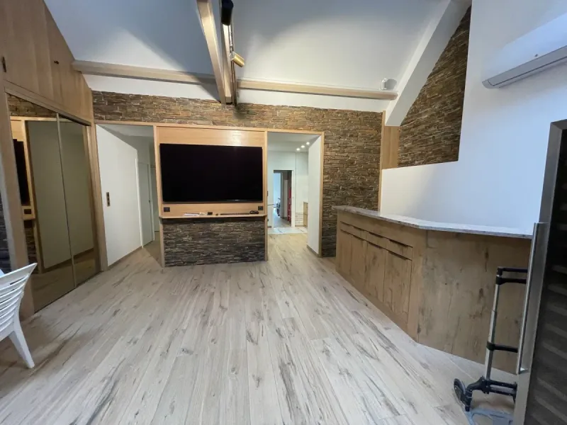 Séjour rénové par ARPE, chantier Chameau
